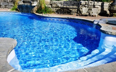 What causes brown stains in pools?